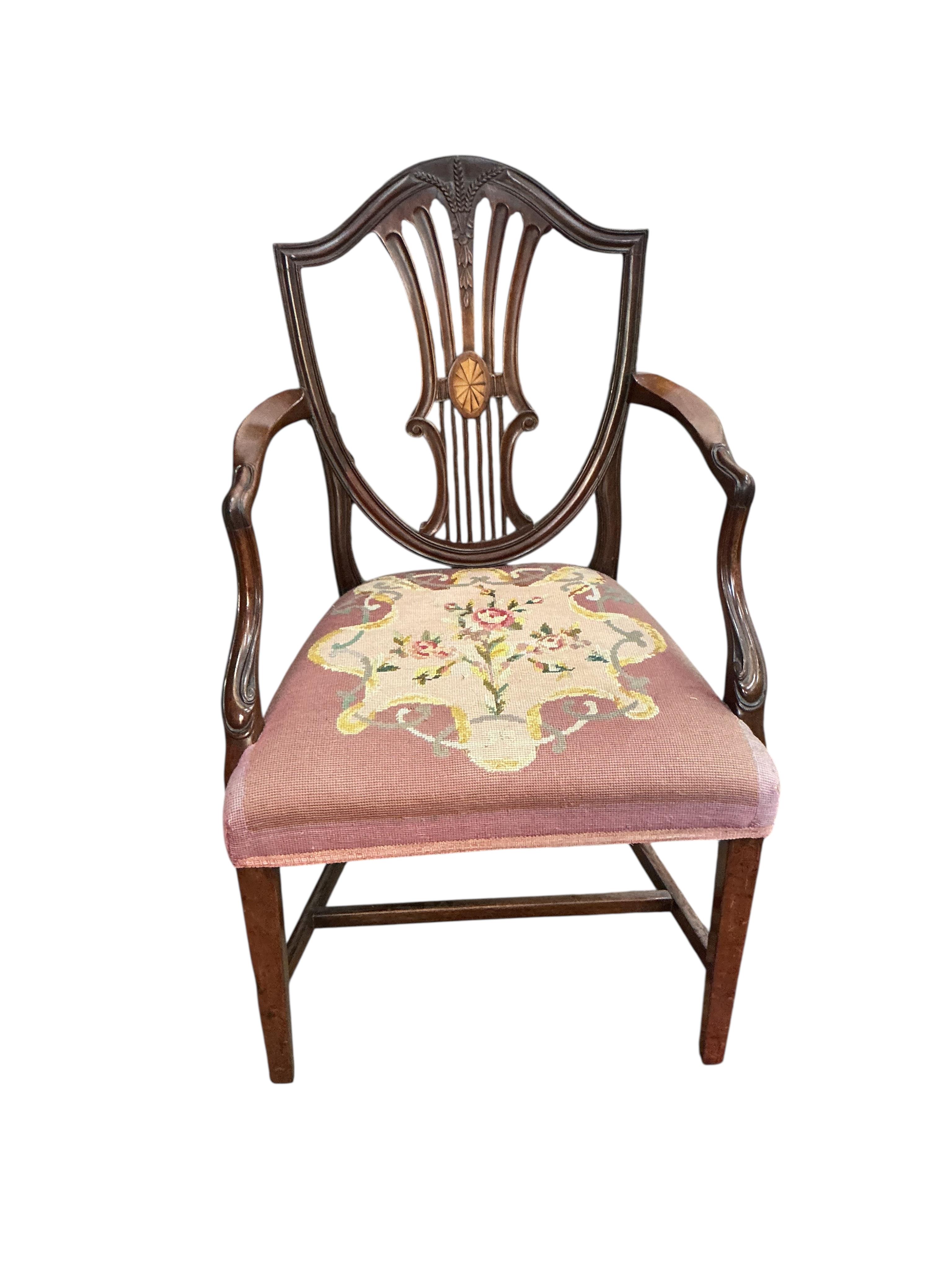 A George III mahogany dining chair and a later George III style inlaid mahogany elbow chair